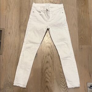 LOFT White Skinny Jeans with distressed hem. Size 25/0
